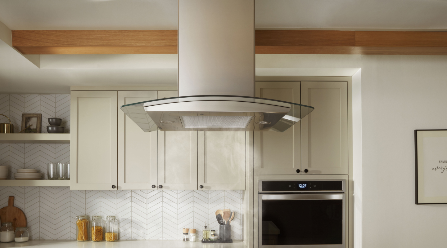 A canopy hood in a modern kitchen. A canopy hood in a modern kitchen.